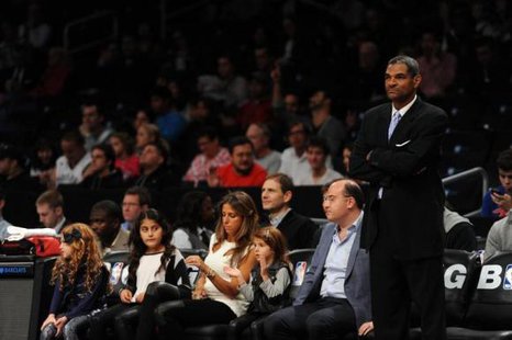 Maurice Cheeks is the one who is standing up in this Reuters photo. Maurice Cheeks is the one who is standing up in this Reuters photo.