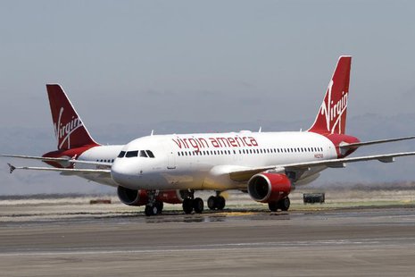 The first Virgin America flights land in San Francisco, California, August 8, 2007. REUTERS/John Decker Virgin America/Pool The first Virgin America flights land in San Francisco, California, August 8, 2007. REUTERS/John Decker Virgin America/Pool