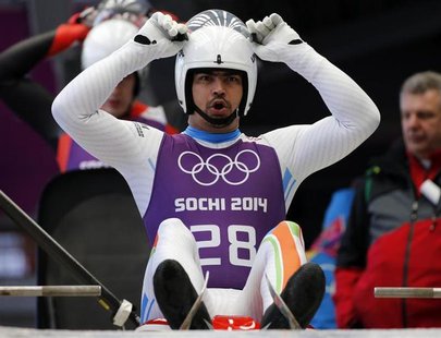 India's Shiva Keshavan prepares for the start during the men's luge training at the Sanki sliding center in Rosa Khutor, a venue for the Soc India's Shiva Keshavan prepares for the start during the men's luge training at the Sanki sliding center in Rosa Khutor, a venue for the Soc