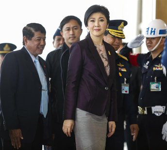 Thailand Prime Minister Yingluck Shinawatra (C) arrives at the Royal Thai Air Force headquarters before a cabinet meeting in Bangkok Februar Thailand Prime Minister Yingluck Shinawatra (C) arrives at the Royal Thai Air Force headquarters before a cabinet meeting in Bangkok Februar