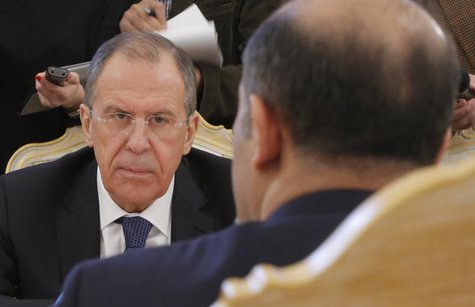Russia's Foreign Minister Sergei Lavrov listens during a meeting with Syrian opposition leader Ahmad Jarba in Moscow February 4, 2014. REUTE Russia's Foreign Minister Sergei Lavrov listens during a meeting with Syrian opposition leader Ahmad Jarba in Moscow February 4, 2014. REUTE
