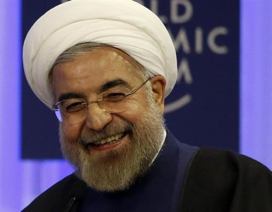 Iran's President Hassan Rouhani smiles during a session at the annual meeting of the World Economic Forum (WEF) in Davos January 23, 2014. R Iran's President Hassan Rouhani smiles during a session at the annual meeting of the World Economic Forum (WEF) in Davos January 23, 2014. R