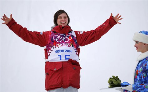 Canada's third-placed Kim Lamarre celebrates on podium during a flower ceremony after the women's freestyle skiing slopestyle finals at the Canada's third-placed Kim Lamarre celebrates on podium during a flower ceremony after the women's freestyle skiing slopestyle finals at the