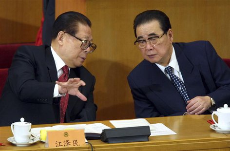 China's President Jiang Zemin (L) talks with top lawmaker Li Peng, Chairman of the National People's Congress, during the opening ceremony o China's President Jiang Zemin (L) talks with top lawmaker Li Peng, Chairman of the National People's Congress, during the opening ceremony o