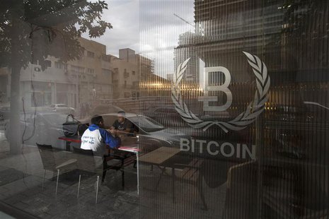 People sit inside the Bitcoin Embassy in Tel Aviv February 2, 2014. REUTERS/Baz Ratner People sit inside the Bitcoin Embassy in Tel Aviv February 2, 2014. REUTERS/Baz Ratner
