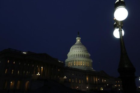 The Capitol building is seen before U.S. President Barack Obama delivers his State of the Union address in front of the U.S. Congress, on Ca The Capitol building is seen before U.S. President Barack Obama delivers his State of the Union address in front of the U.S. Congress, on Ca