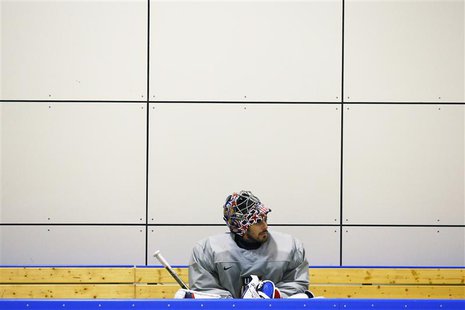 The U.S. men's hockey team goaltender Ryan Miller sits on the bench during a team USA practice at the 2014 Sochi Winter Olympics February 11 The U.S. men's hockey team goaltender Ryan Miller sits on the bench during a team USA practice at the 2014 Sochi Winter Olympics February 11