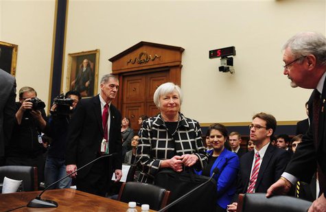 Federal Reserve Chair Janet Yellen (C) arrives to testify before a House Financial Services Committee hearing on "Monetary Policy and the St Federal Reserve Chair Janet Yellen (C) arrives to testify before a House Financial Services Committee hearing on "Monetary Policy and the St