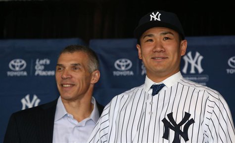 Feb 11, 2014; Bronx, NY, USA; New York Yankees manager Joe Girardi introduces new right hand pitcher Masahiro Tanaka, during press conferenc Feb 11, 2014; Bronx, NY, USA; New York Yankees manager Joe Girardi introduces new right hand pitcher Masahiro Tanaka, during press conferenc