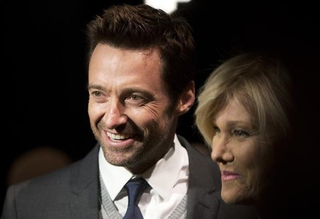 Actor Hugh Jackman (L) and wife Deborra-Lee Furness arrive for the Donna Karan New York show during New York Fashion Week February 10, 2014. Actor Hugh Jackman (L) and wife Deborra-Lee Furness arrive for the Donna Karan New York show during New York Fashion Week February 10, 2014.