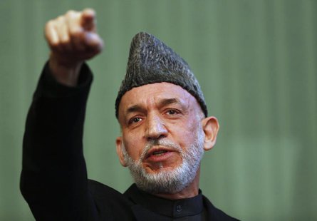 Afghan President Hamid Karzai speaks during a news conference in Kabul January 25, 2014. REUTERS/Mohammad Ismail Afghan President Hamid Karzai speaks during a news conference in Kabul January 25, 2014. REUTERS/Mohammad Ismail