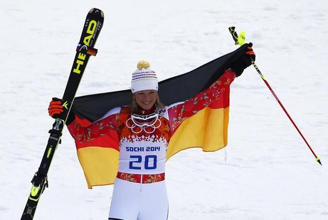 Germany's Maria Hoefl-Riesch celebrates winning the women's alpine skiing super combined event at the 2014 Sochi Winter Olympics at the Rosa Germany's Maria Hoefl-Riesch celebrates winning the women's alpine skiing super combined event at the 2014 Sochi Winter Olympics at the Rosa