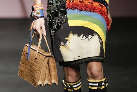 A model presents a creation from Prada Spring/Summer 2014 collection during Milan Fashion Week September 19, 2013. REUTERS/Max Rossi A model presents a creation from Prada Spring/Summer 2014 collection during Milan Fashion Week September 19, 2013. REUTERS/Max Rossi