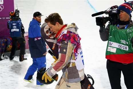 Shaun White of the U.S. walks away after failing to win a medal in the men's snowboard halfpipe qualification round at the 2014 Sochi Winter Shaun White of the U.S. walks away after failing to win a medal in the men's snowboard halfpipe qualification round at the 2014 Sochi Winter