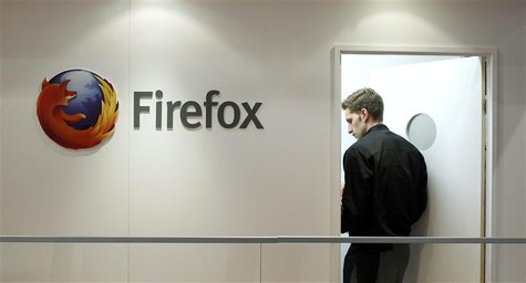 A man is seen next to a Firefox logo at a Mozilla stand during the Mobile World Congress in Barcelona, February 28, 2013. REUTERS/Albert Gea A man is seen next to a Firefox logo at a Mozilla stand during the Mobile World Congress in Barcelona, February 28, 2013. REUTERS/Albert Gea