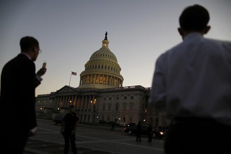 Night falls over the U.S. Capitol Dome, as members of the Republican-controlled U.S. House of Representatives deal with a budget showdown wi Night falls over the U.S. Capitol Dome, as members of the Republican-controlled U.S. House of Representatives deal with a budget showdown wi