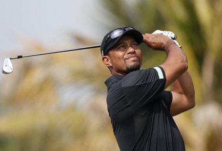 Tiger Woods of the U.S. tees off on the fourth hole during the second round of the 2014 Omega Dubai Desert Classic in Dubai January 31, 2014 Tiger Woods of the U.S. tees off on the fourth hole during the second round of the 2014 Omega Dubai Desert Classic in Dubai January 31, 2014