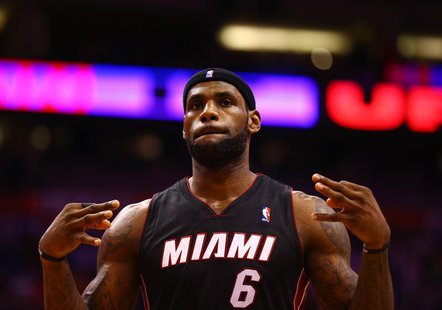 Feb 11, 2014; Phoenix, AZ, USA; Miami Heat forward LeBron James reacts in the fourth quarter against the Phoenix Suns at the US Airways Cent Feb 11, 2014; Phoenix, AZ, USA; Miami Heat forward LeBron James reacts in the fourth quarter against the Phoenix Suns at the US Airways Cent