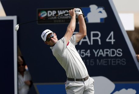 Justin Rose of England tees off on the first hole during the first round of the DP World Tour Championship golf tournament in Dubai November Justin Rose of England tees off on the first hole during the first round of the DP World Tour Championship golf tournament in Dubai November