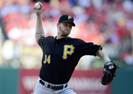 Oct 3, 2013; St. Louis, MO, USA; Pittsburgh Pirates starting pitcher A.J. Burnett (34) throws to a St. Louis Cardinals batter during the fir Oct 3, 2013; St. Louis, MO, USA; Pittsburgh Pirates starting pitcher A.J. Burnett (34) throws to a St. Louis Cardinals batter during the fir