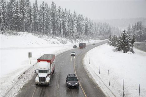 Traffic makes it way slowly up Interstate 80 near Donner Pass in Soda Springs, California, February 8, 2014.
CREDIT: REUTERS/MAX WHITTAKER Traffic makes it way slowly up Interstate 80 near Donner Pass in Soda Springs, California, February 8, 2014.
CREDIT: REUTERS/MAX WHITTAKER