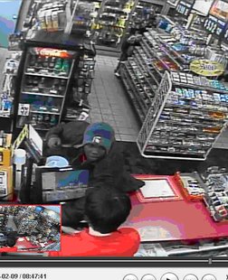 The suspect is scene in surveillance footage. The suspect is scene in surveillance footage.