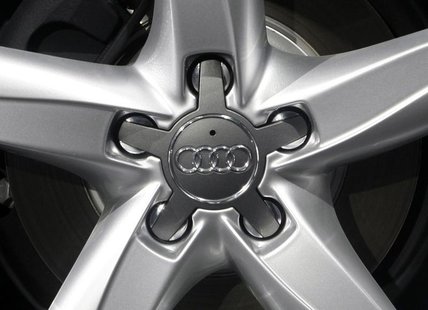 The company logo of Volkswagen's Audi AG premium unit is pictured on the hub caps of a car during the annual news conference in Ingolstadt M The company logo of Volkswagen's Audi AG premium unit is pictured on the hub caps of a car during the annual news conference in Ingolstadt M