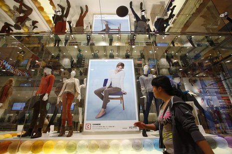 Mannequins wearing cashmere clothes are displayed at Fast Retailing's Uniqlo casual clothing store in Tokyo October 4, 2013. REUTERS/Issei K Mannequins wearing cashmere clothes are displayed at Fast Retailing's Uniqlo casual clothing store in Tokyo October 4, 2013. REUTERS/Issei K