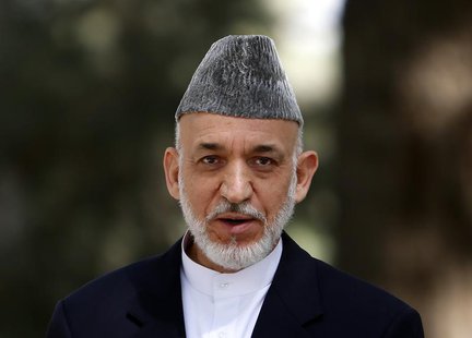 Afghan President Hamid Karzai speaks during a news conference in Kabul October 7, 2013. REUTERS/Mohammad Ismail Afghan President Hamid Karzai speaks during a news conference in Kabul October 7, 2013. REUTERS/Mohammad Ismail