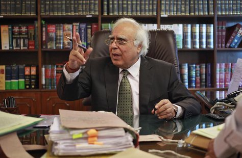 India's Telecommunications Minister Kapil Sibal gestures after an interview with Reuters at his office in New Delhi October 15, 2013. REUTER India's Telecommunications Minister Kapil Sibal gestures after an interview with Reuters at his office in New Delhi October 15, 2013. REUTER