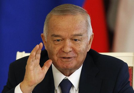 Uzbekistan's President Islam Karimov gestures during a signing ceremony after talks with his Russian counterpart Vladimir Putin at the Kreml Uzbekistan's President Islam Karimov gestures during a signing ceremony after talks with his Russian counterpart Vladimir Putin at the Kreml