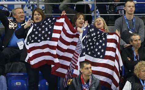 Team USA fans celebrate during the USA versus Slovakia men's preliminary round ice hockey game at the 2014 Sochi Winter Olympics, February 1 Team USA fans celebrate during the USA versus Slovakia men's preliminary round ice hockey game at the 2014 Sochi Winter Olympics, February 1