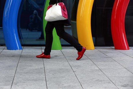 A woman walks past the Google offices near the city center in Dublin July 8, 2013. REUTERS/Cathal McNaughton A woman walks past the Google offices near the city center in Dublin July 8, 2013. REUTERS/Cathal McNaughton