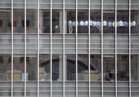 Staff stand in a meeting room at Lehman Brothers offices in the financial district of Canary Wharf in London September 11, 2008. REUTERS/Kev Staff stand in a meeting room at Lehman Brothers offices in the financial district of Canary Wharf in London September 11, 2008. REUTERS/Kev
