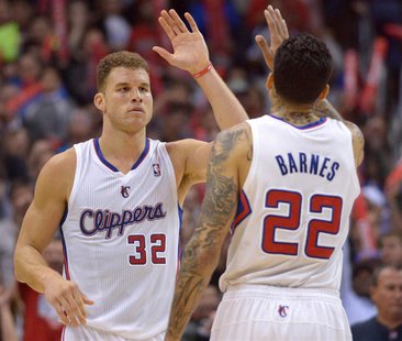 Los Angeles Clippers forwards Blake Griffin (32) and Matt Barnes (22) exchange high fives in the fourth quarter against the Portland Trail B Los Angeles Clippers forwards Blake Griffin (32) and Matt Barnes (22) exchange high fives in the fourth quarter against the Portland Trail B