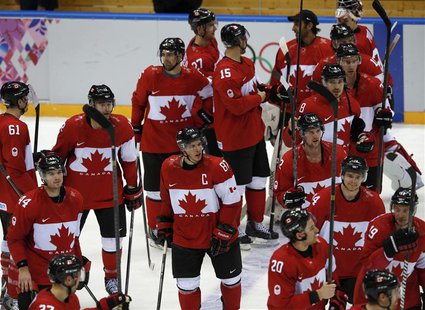Canada's Sidney Crosby (C) and his teammates salute the fans after defeating Norway in their men's preliminary round ice hockey game at the Canada's Sidney Crosby (C) and his teammates salute the fans after defeating Norway in their men's preliminary round ice hockey game at the
