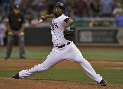 Tampa Bay Rays closer Fernando Rodney pitches against the Boston Red Sox during the ninth inning of their MLB American League baseball game Tampa Bay Rays closer Fernando Rodney pitches against the Boston Red Sox during the ninth inning of their MLB American League baseball game