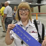 First Lieutenant Janet Watson, Historian, CAP’s Yuma Composite Squadron 508 of the Arizona Wing holds a banner dedicating hangar to Joe Foss. (Photo Courtesy C.A.P.) First Lieutenant Janet Watson, Historian, CAP’s Yuma Composite Squadron 508 of the Arizona Wing holds a banner dedicating hangar to Joe Foss. (Photo Courtesy C.A.P.)
