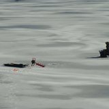 Someone ice fishing. Someone ice fishing.