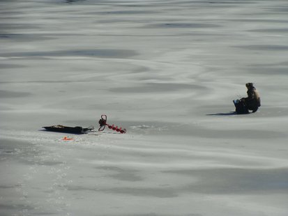 Someone ice fishing. Someone ice fishing.