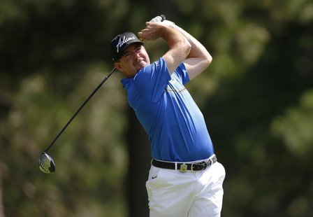 Robert Garrigus of the U.S. tees off on the fourth hole during the third round of the 2013 PGA Championship golf tournament at Oak Hill Coun Robert Garrigus of the U.S. tees off on the fourth hole during the third round of the 2013 PGA Championship golf tournament at Oak Hill Coun