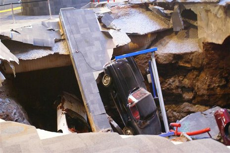 A 40-foot sinkhole that opened up under the National Corvette Museum and swallowed eight Corvettes, including the historic 1992 White 1 Mill A 40-foot sinkhole that opened up under the National Corvette Museum and swallowed eight Corvettes, including the historic 1992 White 1 Mill