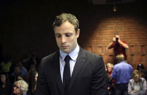 Olympic and Paralympic running star Oscar Pistorius stands during court proceedings at the Pretoria Magistrates court August 19, 2013. REUTE Olympic and Paralympic running star Oscar Pistorius stands during court proceedings at the Pretoria Magistrates court August 19, 2013. REUTE