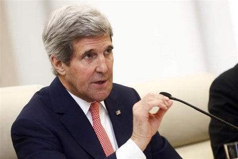 U.S. Secretary of State John Kerry gestures as he speaks to Chinese Foreign Minister Wang Yi (not seen) during their meeting at the Ministry U.S. Secretary of State John Kerry gestures as he speaks to Chinese Foreign Minister Wang Yi (not seen) during their meeting at the Ministry