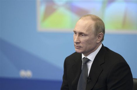 Russia's President Vladimir Putin meets with members of the Public Council for the Sochi 2014 Olympic Winter Games preparation and organizat Russia's President Vladimir Putin meets with members of the Public Council for the Sochi 2014 Olympic Winter Games preparation and organizat