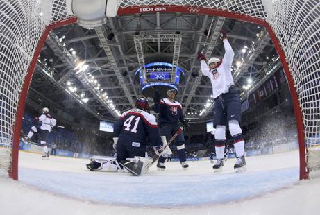 Team USA's John Carlson (L) celebrates his goal on Slovakia's goalie Jaroslav Halak (41) as Team USA's James van Riemsdyk (R) reacts during the first period of their men's preliminary round ice hockey More...
Credit: REUTERS/Martin Rose/Pool Team USA's John Carlson (L) celebrates his goal on Slovakia's goalie Jaroslav Halak (41) as Team USA's James van Riemsdyk (R) reacts during the first period of their men's preliminary round ice hockey More...
Credit: REUTERS/Martin Rose/Pool