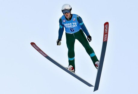 Dec 29, 2013; Park City, UT, USA; Nicholas Fairall of the United States is airborne during his ski jump during the U.S. Olympic Trials at th Dec 29, 2013; Park City, UT, USA; Nicholas Fairall of the United States is airborne during his ski jump during the U.S. Olympic Trials at th