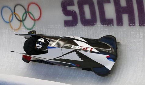 Two-man bobsleigh pilot Cory Butner of the U.S. speeds down the track during a training session of the Sochi 2014 Winter Olympic Games at th Two-man bobsleigh pilot Cory Butner of the U.S. speeds down the track during a training session of the Sochi 2014 Winter Olympic Games at th