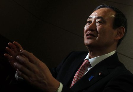 Japan's Chief Cabinet Secretary Yoshihide Suga speaks during an interview with Reuters in Tokyo February 15, 2014. REUTERS/Yuya Shino Japan's Chief Cabinet Secretary Yoshihide Suga speaks during an interview with Reuters in Tokyo February 15, 2014. REUTERS/Yuya Shino