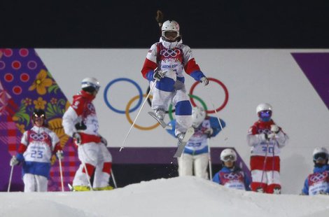 Russian freestyle skier Maria Komissarova practices during a night training session for the 2014 Sochi Winter Olympics at the extreme park i Russian freestyle skier Maria Komissarova practices during a night training session for the 2014 Sochi Winter Olympics at the extreme park i